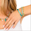Bracciale elegante resistente all'acqua con motivo geometrico colorato.