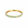 Bracciale Positano rigido in acciaio inox waterproof color oro con motivo smaltato azzurro e giallo.